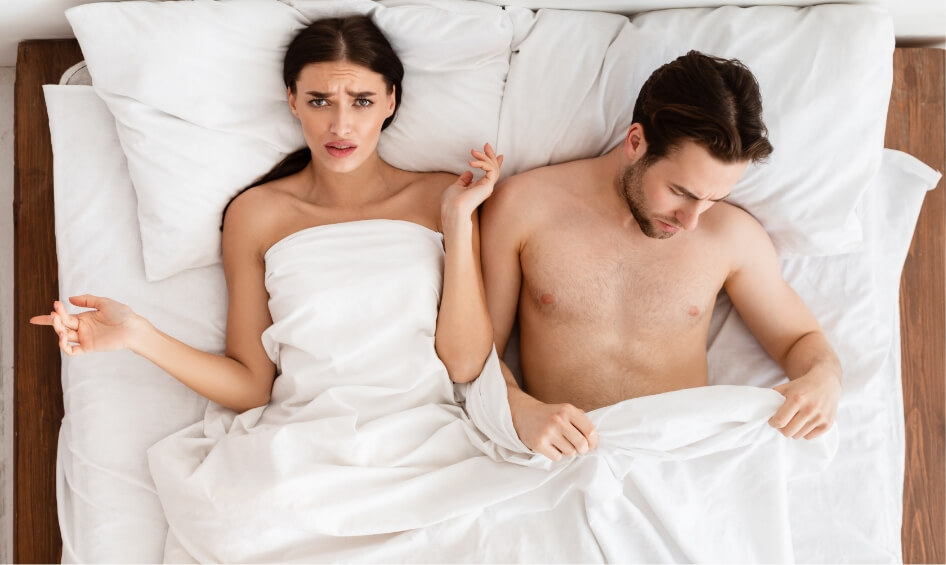 displeased-girlfriend-lying-near-boyfriend-with-er-2023-11-27-05-24-41-utc (1)