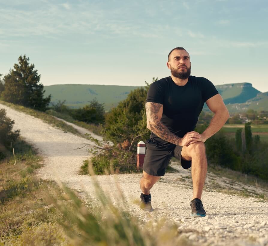 male-athlete-warming-up-before-start-running-in-mo-2023-11-27-05-32-27-utc (1)